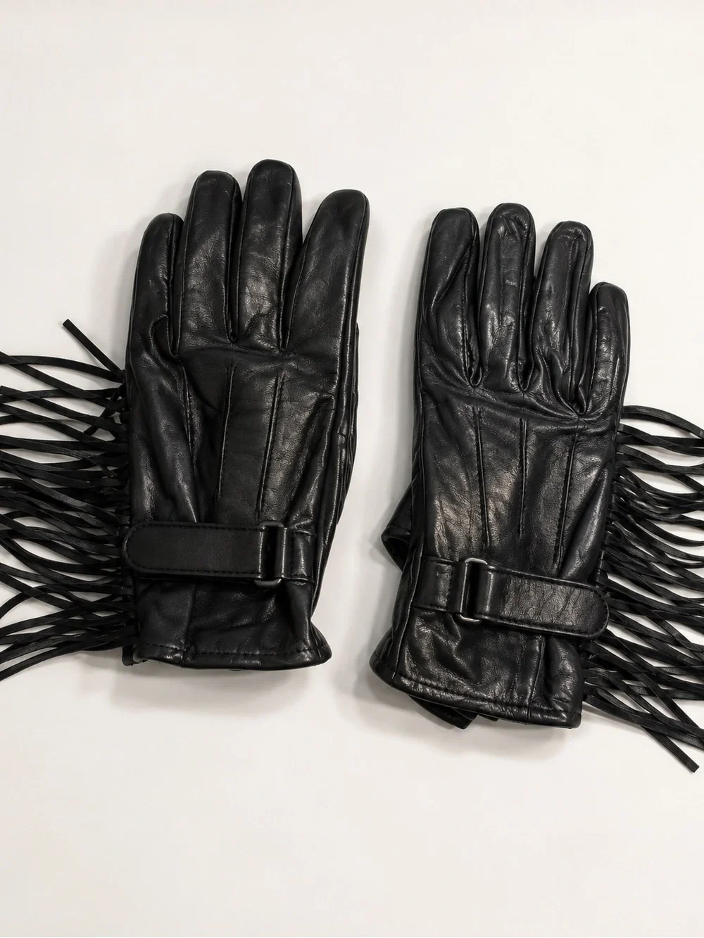 Women’s black leather motorcycle gloves fringe detailing adjustable closure